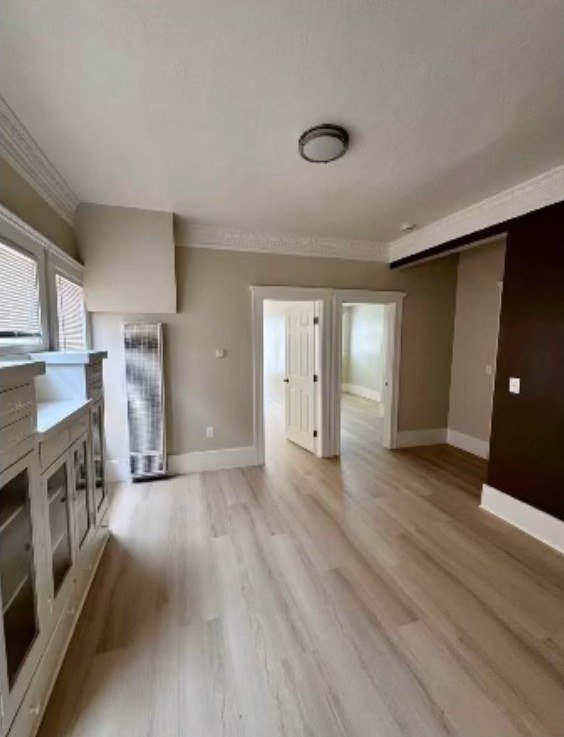 Finished unit with new flooring and a second bedroom